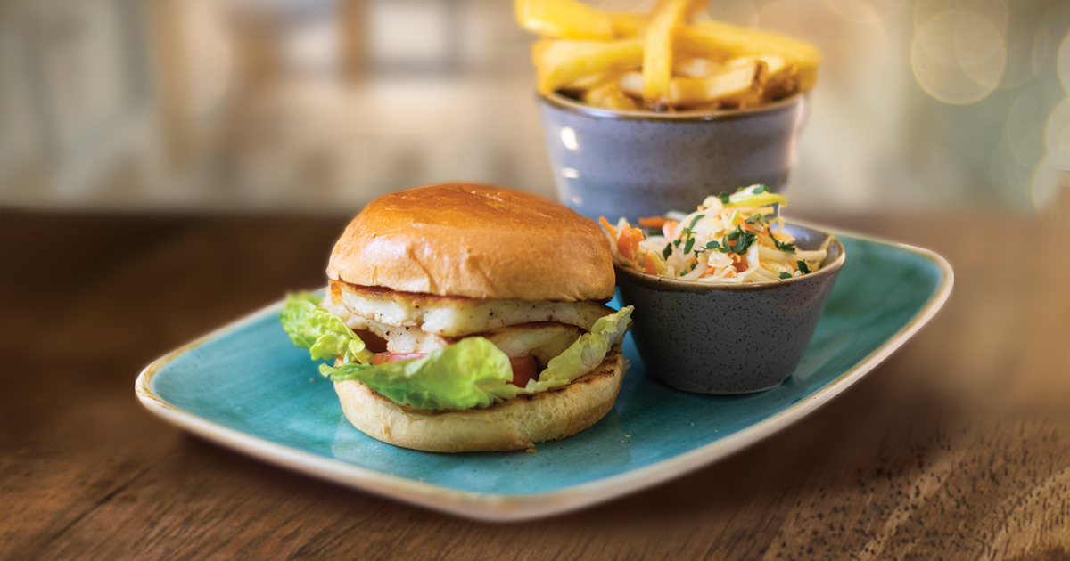 Halloumi Burger with homemade slaw and skin on fries